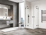 Koupelna v černo-bílé kombinaci: elegantní sprchové zástěny ANNEA BLACK od SanSwiss